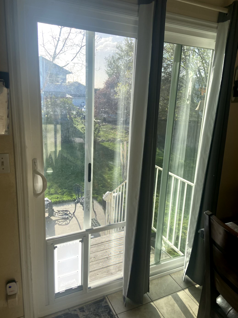 Sliding door with sunlight and curtains