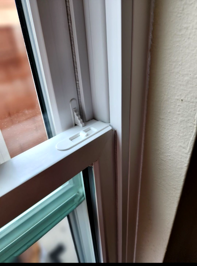 Close-up of window latch mechanism