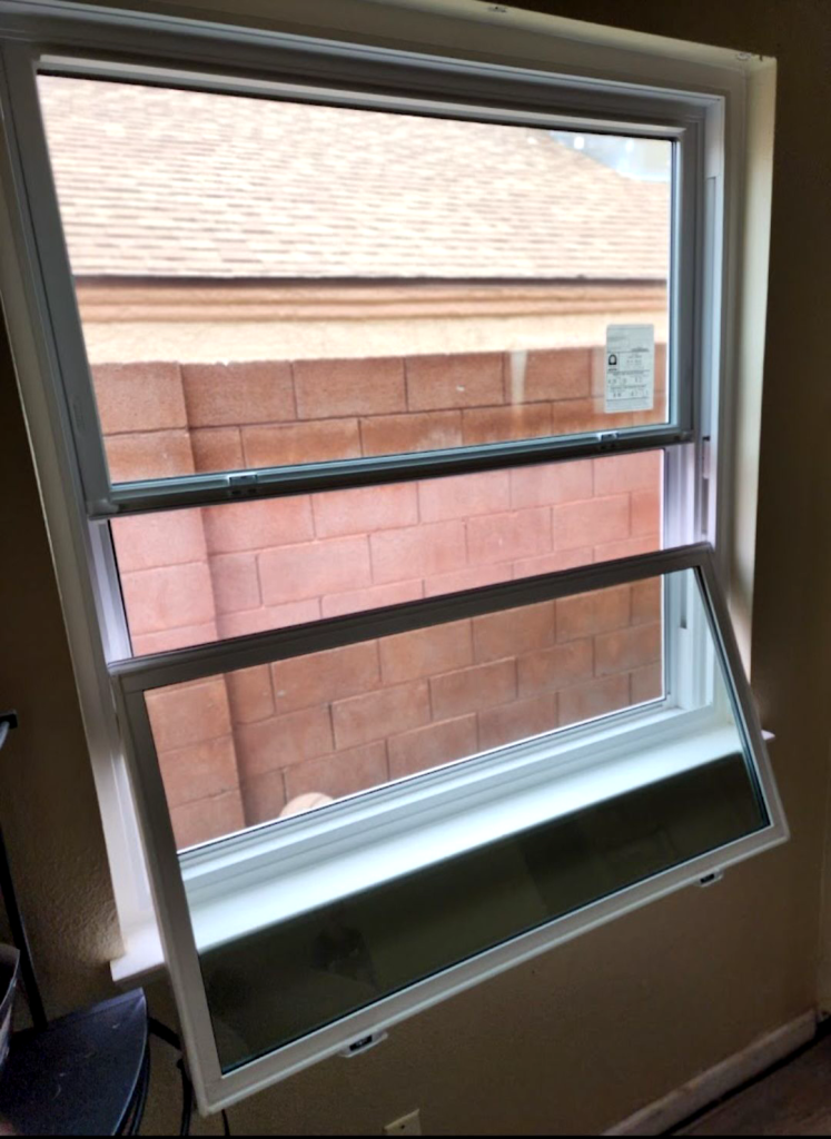 Open window with a view outside.