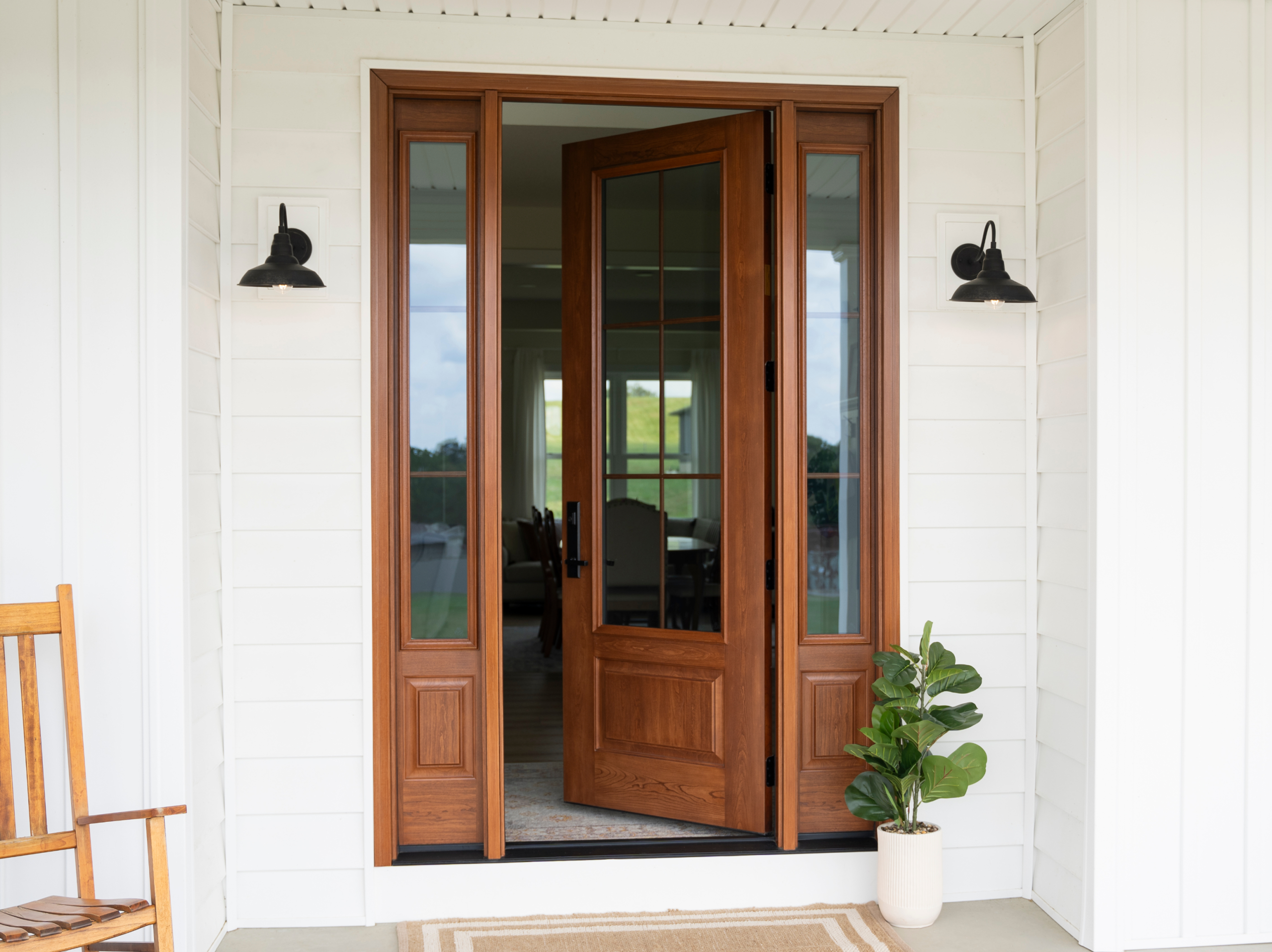 Elegant wooden door with sidelights